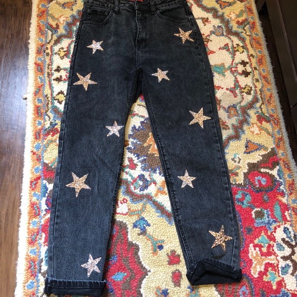 black jeans with stars on them